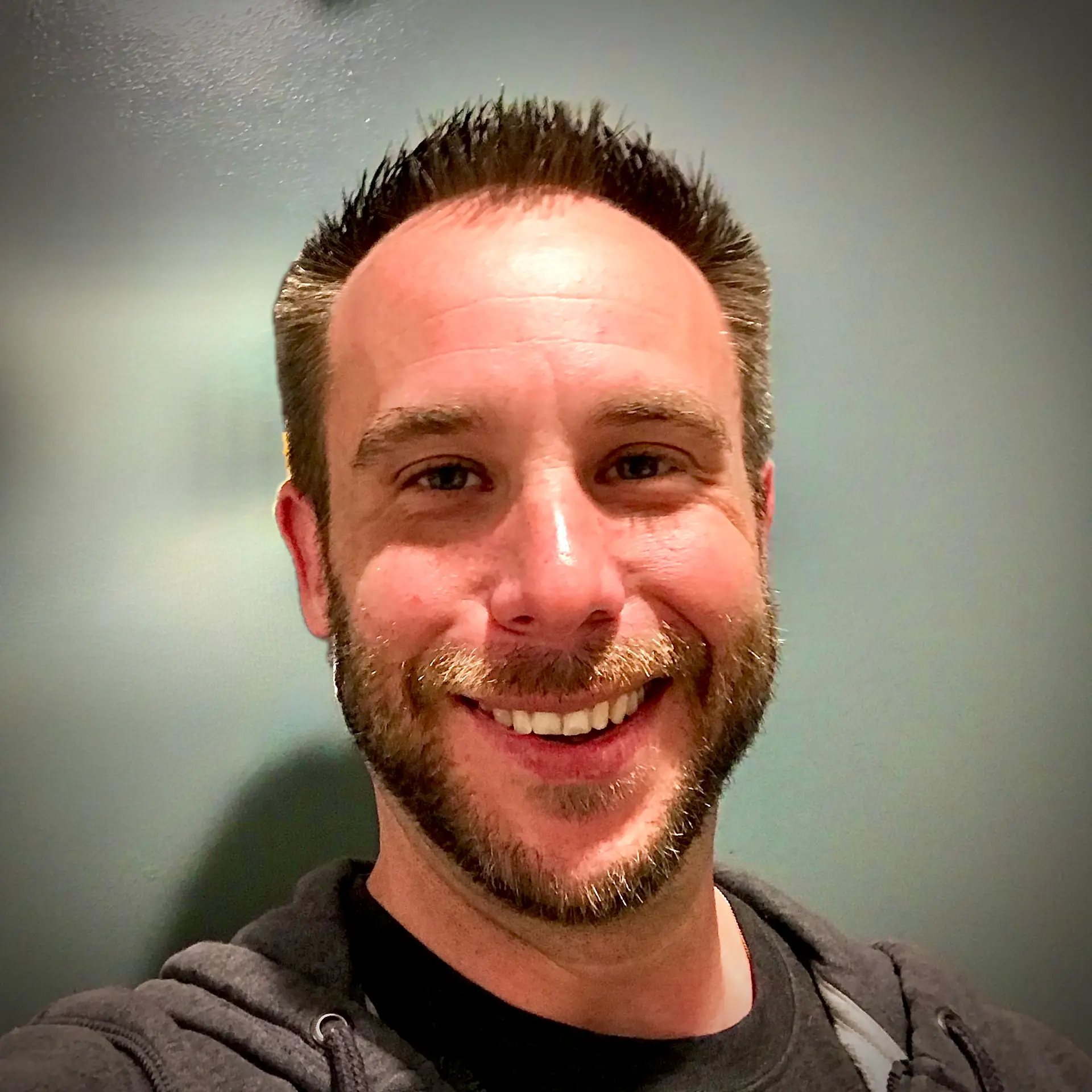 Photo of Matt Lobanoff, founder of Eli80, smiling.